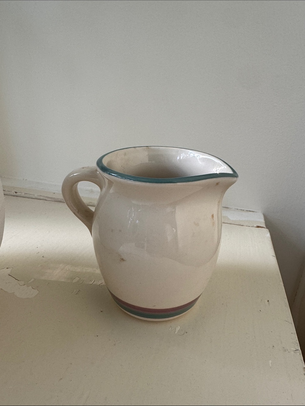 Cream Ceramic Small Pitcher with Teal Rim and Multicolor Stripe